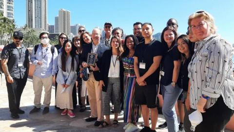 Dean Jon Gould is surrounded by UCI students, alumni and faculty at the Western Society of Criminology conference.