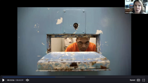 Professor Charis Kubrin interviewing an inmate.